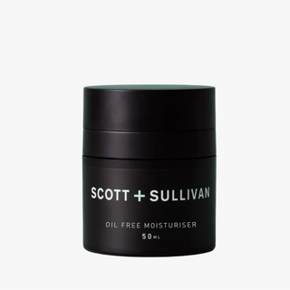 Black jar of Scott + Sullivan oil-free moisturizer on a white background